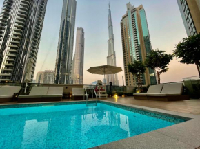 Luxurious & Spacious 2BR l Burj & Fountain Views l Walk to Dubai Mall l Pool l Gym